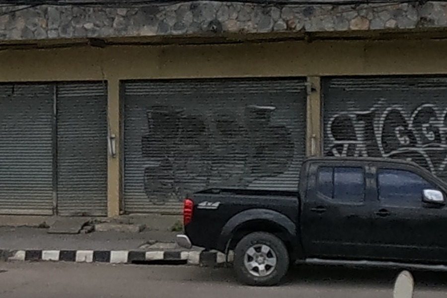 Tags on a shuttered shopfront