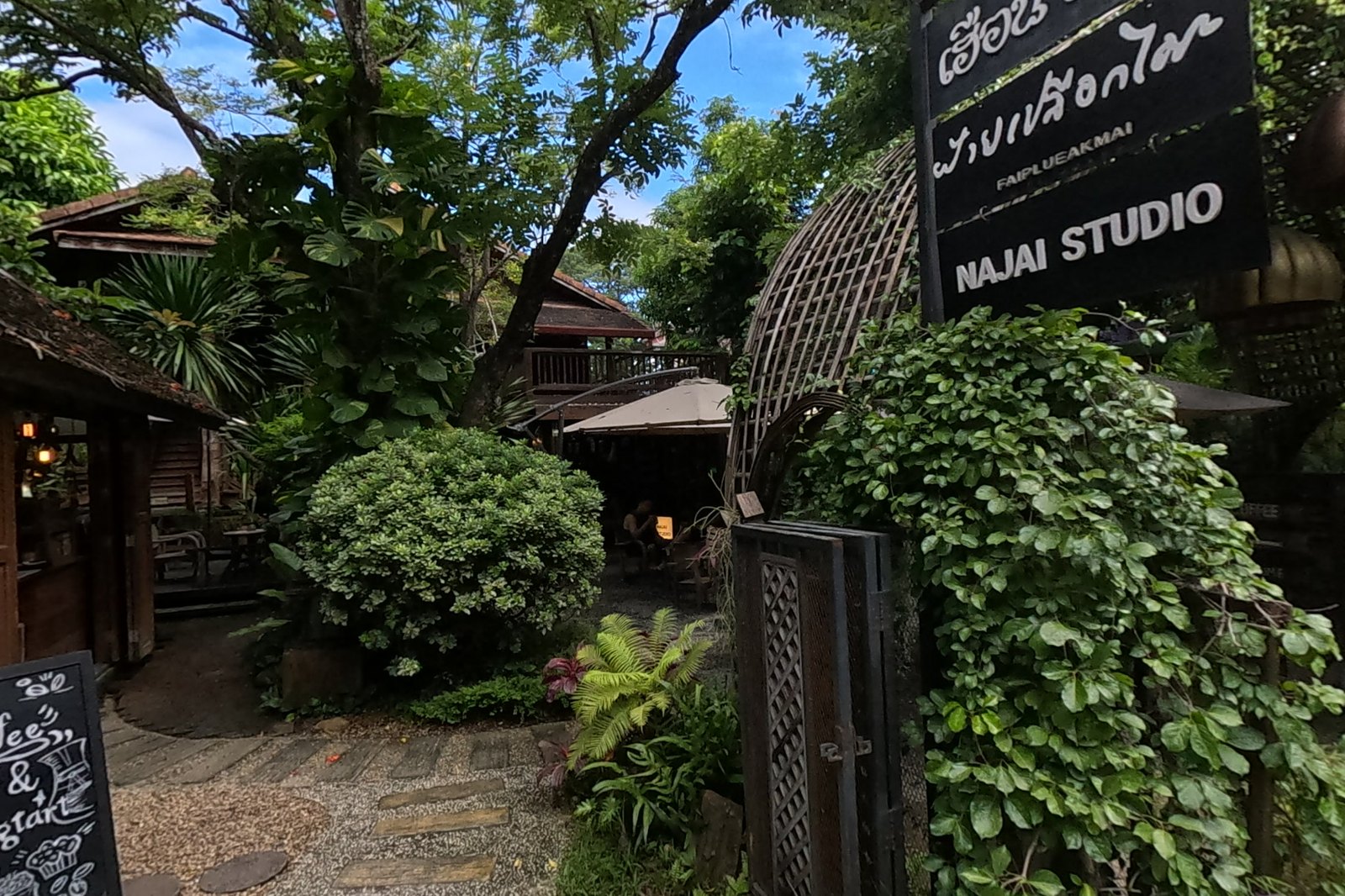 NAJAI STUDIO's garden gate — Chamcha Market, San Kamphaeng