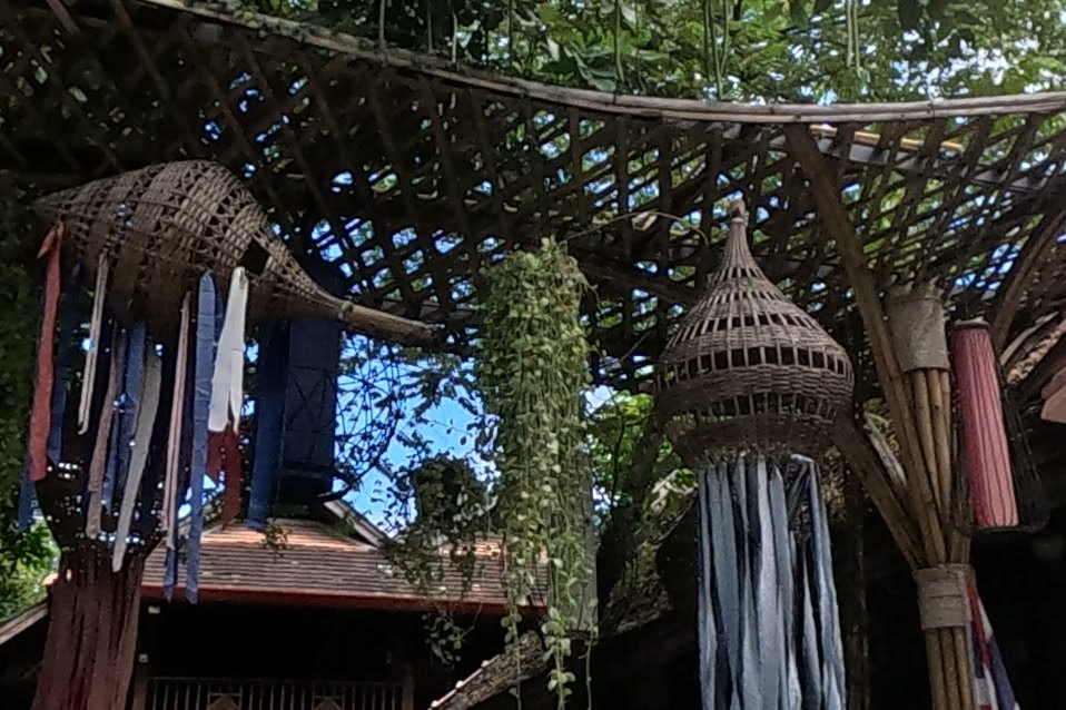 Woven lanterns with cloth tails at Baan Pengjai — Chamcha Market, San Kamphaeng