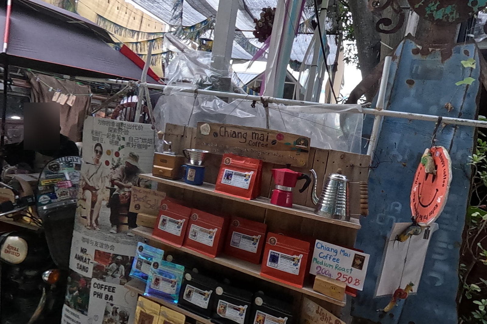 Coffee Phi Ba at Chamcha Market, San Kamphaeng: coffee from a Royal Enfield motorbike stall; beans by the bag