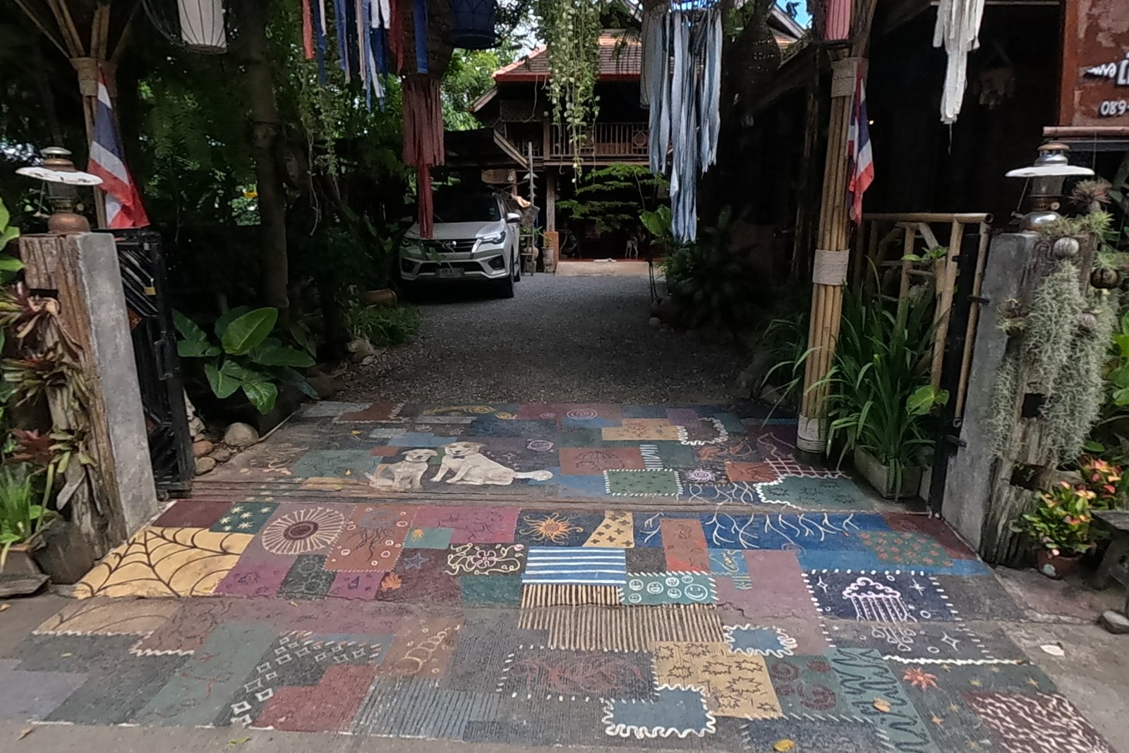 Painted mosaic forecourt at Peng Jai — Chamcha Market, San Kamphaeng