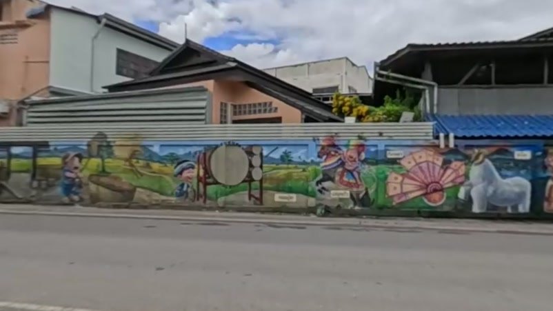 Lanna cultural mural: drum, rider, fan and horse — San Kamphaeng