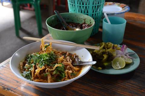Khao soi (Thai script: ข้าวซอย) is a dish from Northern Thailand with mixed deep-fried egg noodles and cooked egg noodles served in a coconut based curry with meat (most often chicken as with the khao