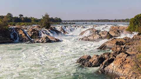 Khone Phapheng Falls, Si Phan Don, Laos. Located on the Mekong River near the border with Cambodia, at 10.7 kilometres (6.6 mi) wide, it is the widest waterfall in the world.