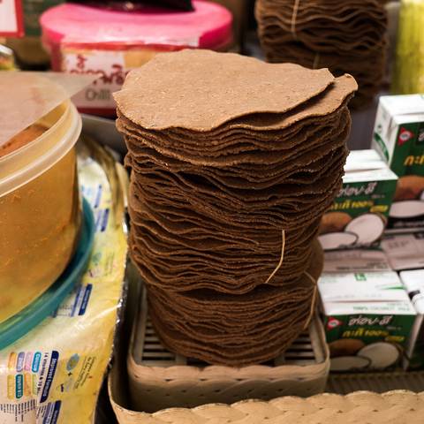 Tua nao (Thai script: ถั่วเน่า) are a food ingredient made from fermented soy beans in the form of round patties. Within Thailand, they are mainly used in northern Thai cuisine. This ingredient is ass