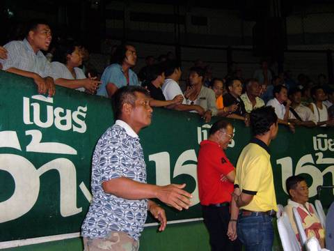The Muay Thai audience at Rajadamnern Stadium in Bangkok, Thailand.