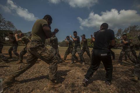U.S. Marine Corps Sgt. Absalom Burton, with Maritime Raid Force, 31st Marine Expeditionary Unit, practices Muay Thai techniques with Royal Thai Reconnaissance Marines during Cobra Gold 16 at Sattahip,