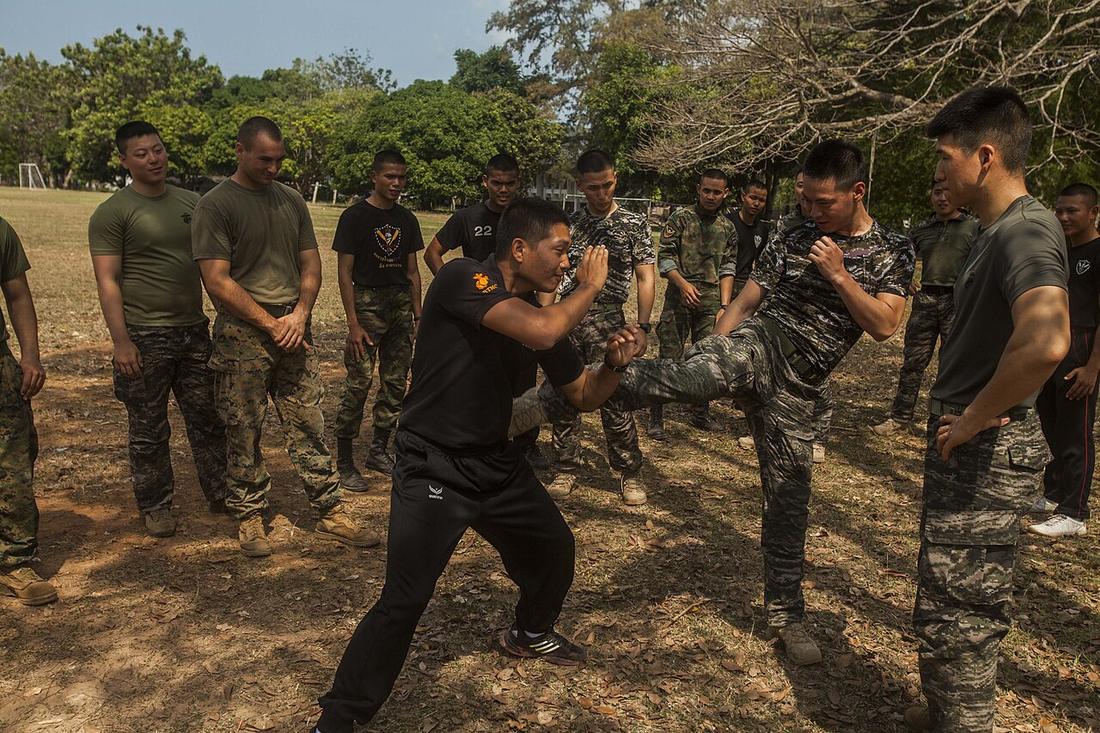 Service members from the Royal Thai, Republic of Korea, and U.S. Marines practice Muay Thai techniques with Royal Thai Reconnaissance Marines during Cobra Gold 16 at Sattahip, Thailand, Feb. 11, 2016.