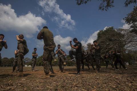 Service members from the Royal Thai, Republic of Korea, and U.S. Marines practice Muay Thai techniques with Royal Thai Reconnaissance Marines during Cobra Gold 16 at Sattahip, Thailand, Feb. 11, 2016.