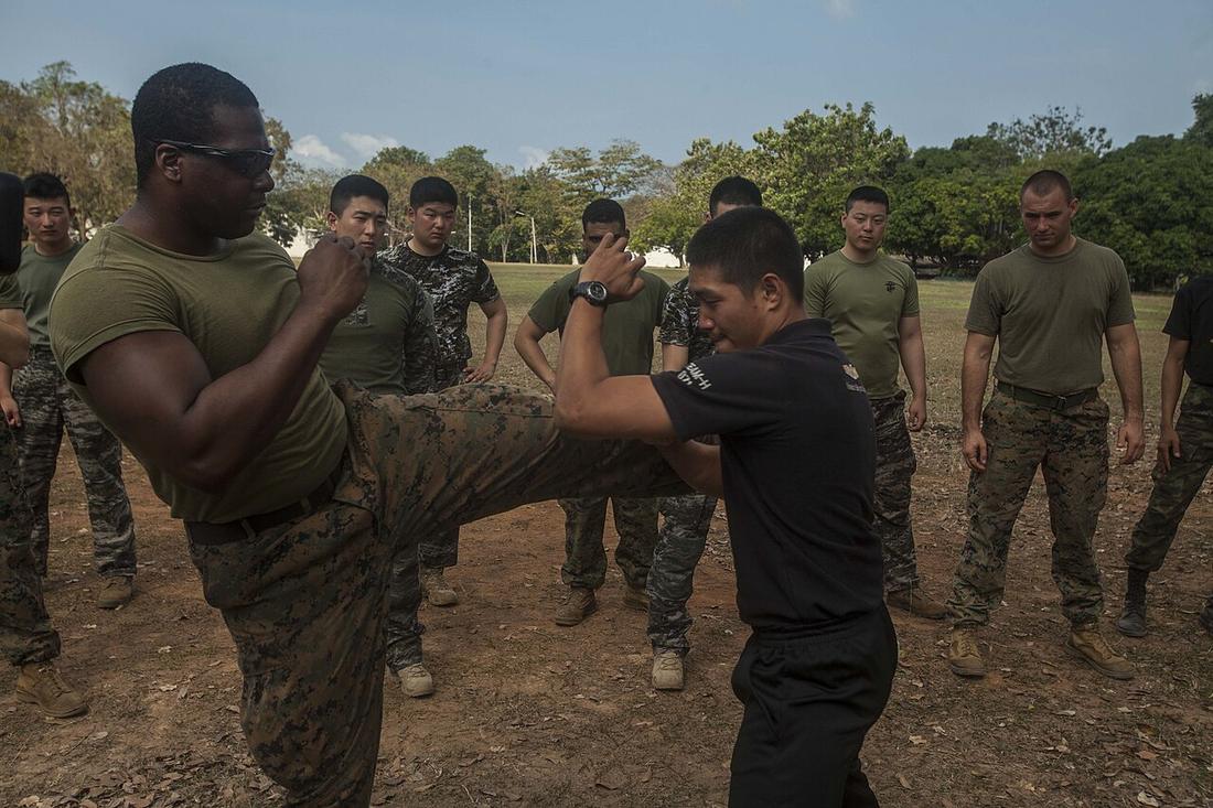 U.S. Marine Corps Sgt. Absalom Burton with Maritime Raid Force, 31st Marine Expeditionary Unit practices Muay Thai techniques with Royal Thai Reconnaissance Marines during Cobra Gold 16 at Sattahip, T