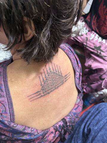 A yant finished on the nape of the neck, at Sak Yant Chiang Mai.