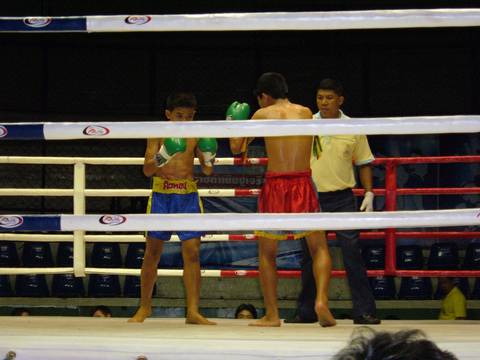 A Muay Thai match at Rajadamnern Stadium in Bangkok, Thailand.