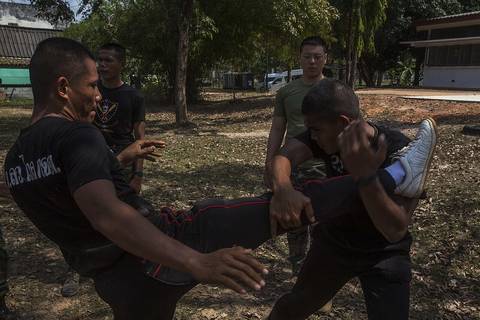 Royal Thai Marines demonstrate a Muay Thai martial arts techniques to U.S., Royal Thai and Republic of Korea Marines during Cobra Gold 16 at Sattahip, Thailand, Feb. 11, 2016. CG 16 is a multinational