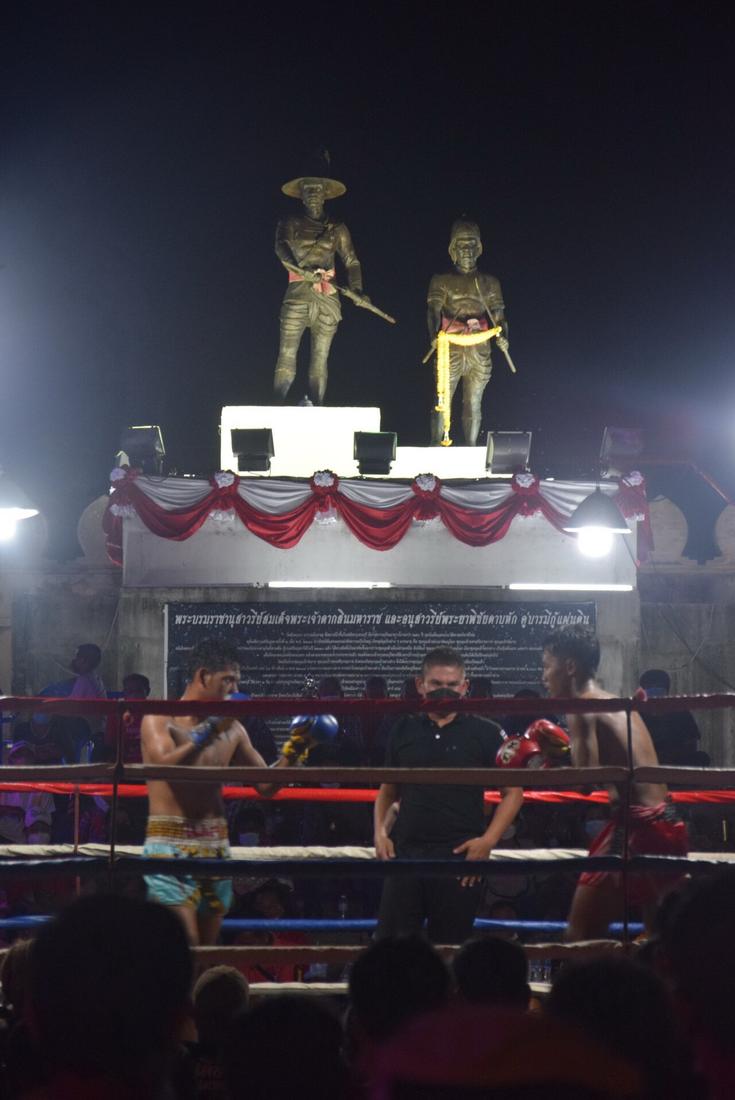 Muay Thai infront of King Taksin &amp; Phraya Pichai Dabhak Monument. Statue found in Hat-Sung Palace (Wat Kungtapao), Uttaradit Province, Thailand.