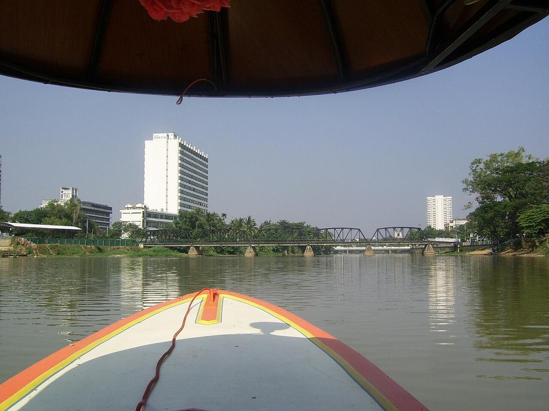 Ping River in Chiang Mai with Khua Lek (Iron Bridge) and Diamond Riverside Hotel.