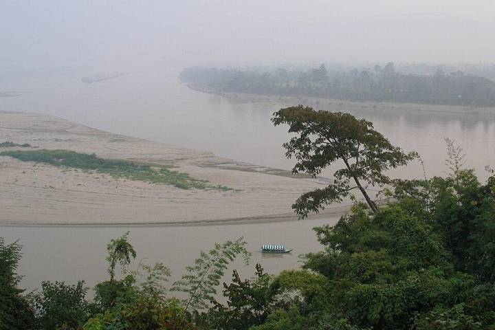 Golden Triangle of Southeast Asia, area where the borders of Thailand, Laos, and Myanmar meet at the confluence of the Ruak and Mekong rivers. Chiang Saen, Chiang Rai, Northern Thailand.