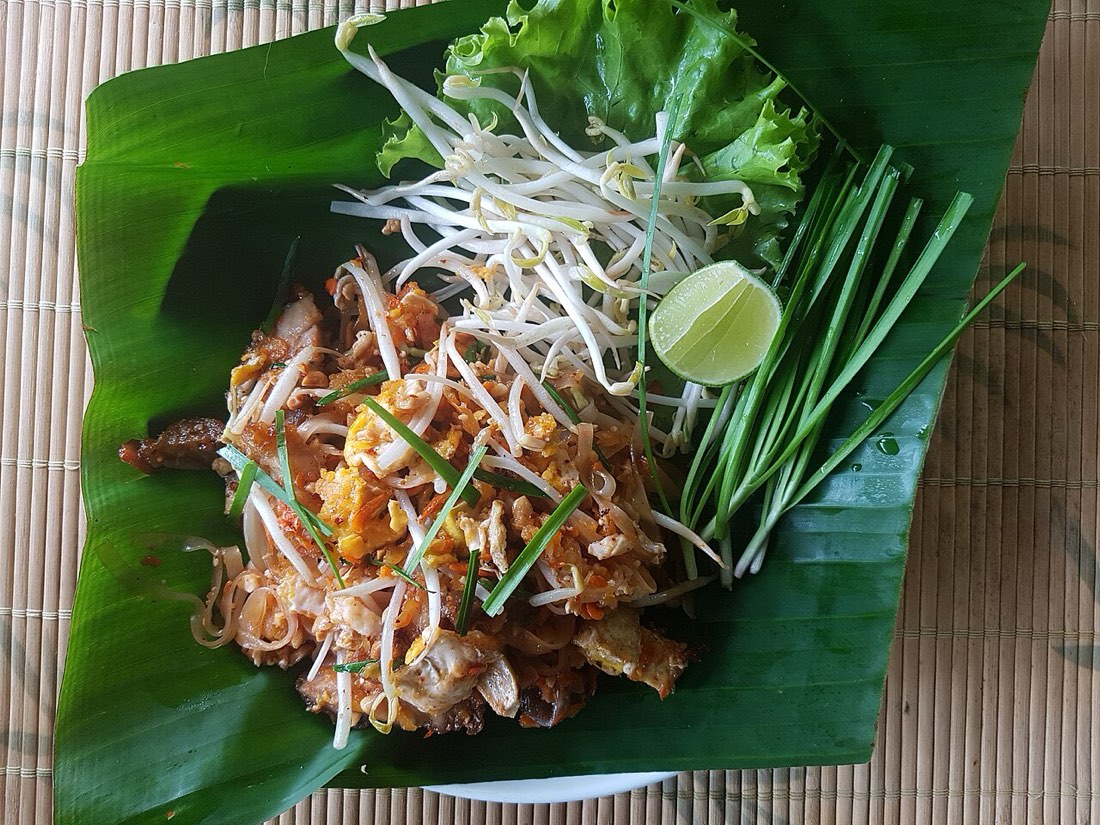 Crispy pork phat thai (ผัดไทยหมูกรอบ) as sold in Chiang Rai, Thailand.