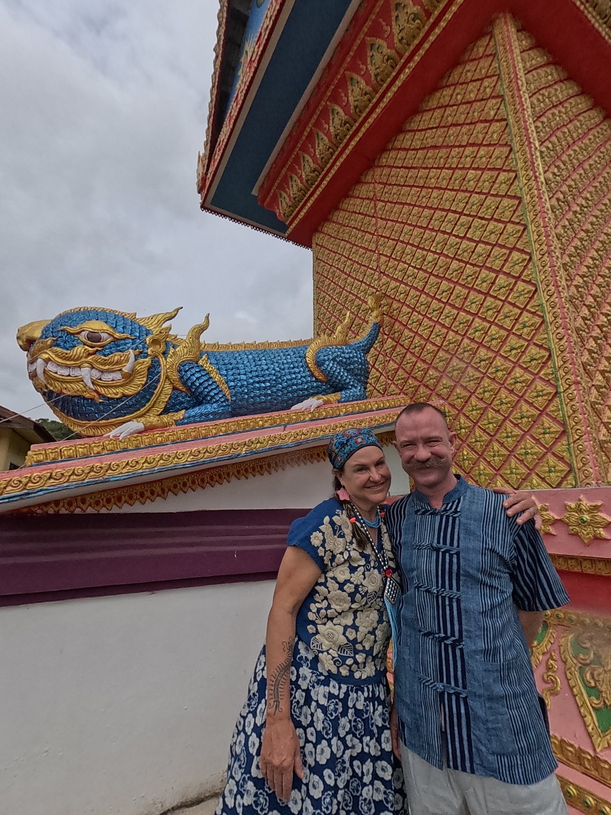 NaN and Michael under the blue singha, Wat Mueang Luek.