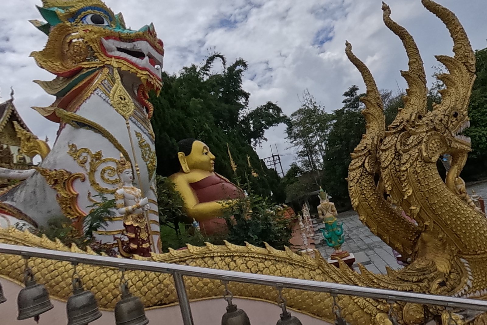Naga, singha and the laughing Buddha.