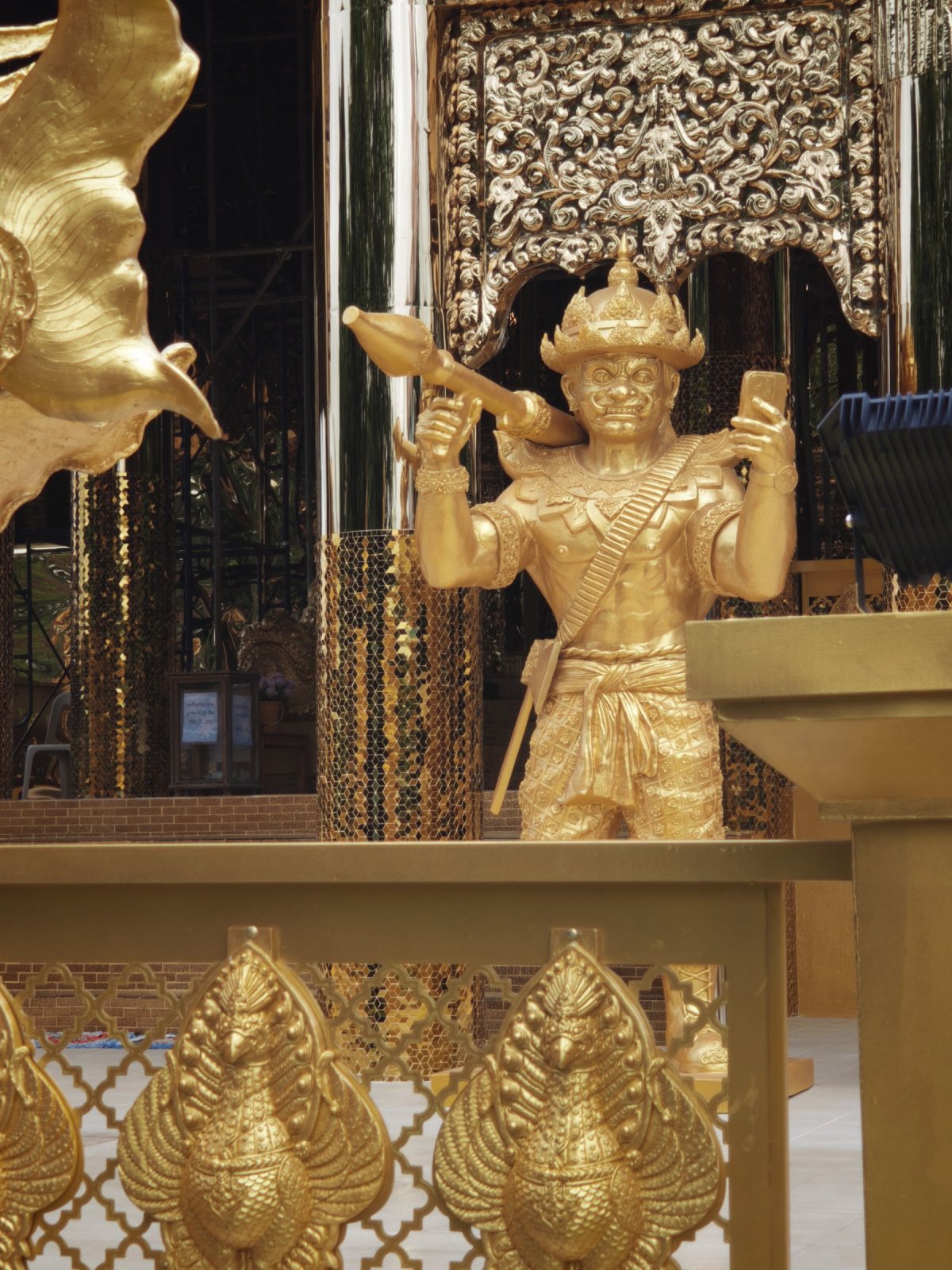 A gold guardian at the door.