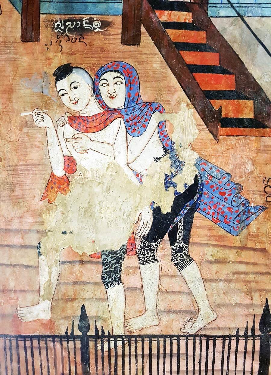 The Whisper of Love mural, a man murmuring to a woman.