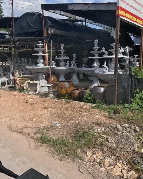 Concrete fountains and garden statues