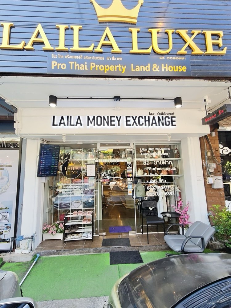 Laila Money Exchange's front under the LAILA LUXE crown sign