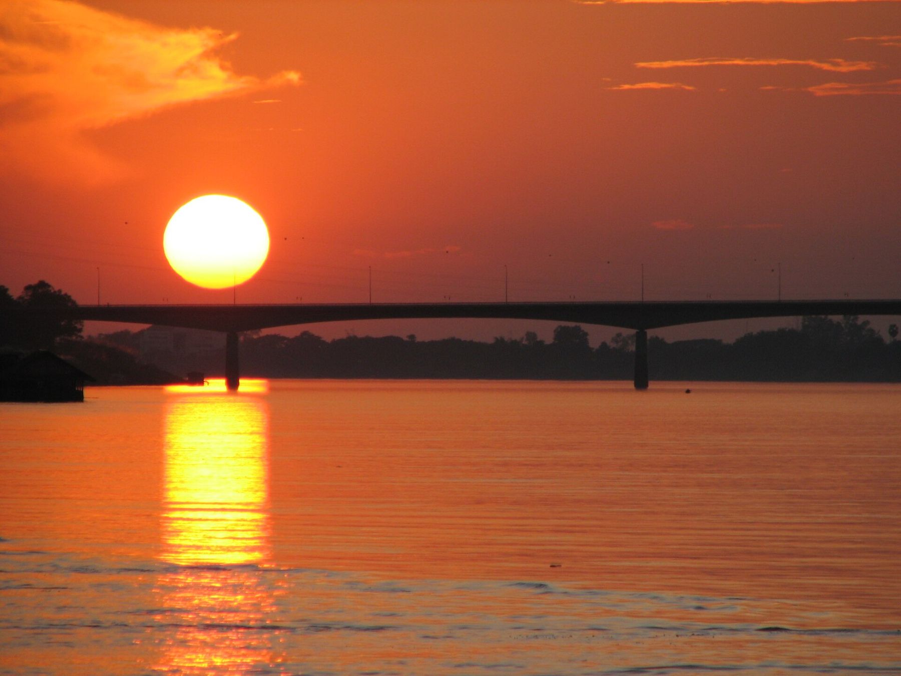 Sunset over the Mekong and the Friendship Bridge at Nong Khai