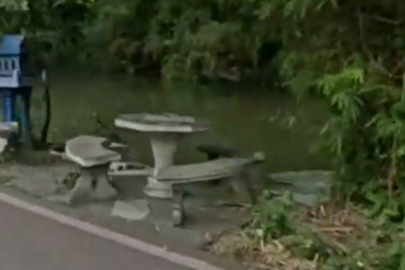 Canal-side picnic tables under bamboo — San Kamphaeng