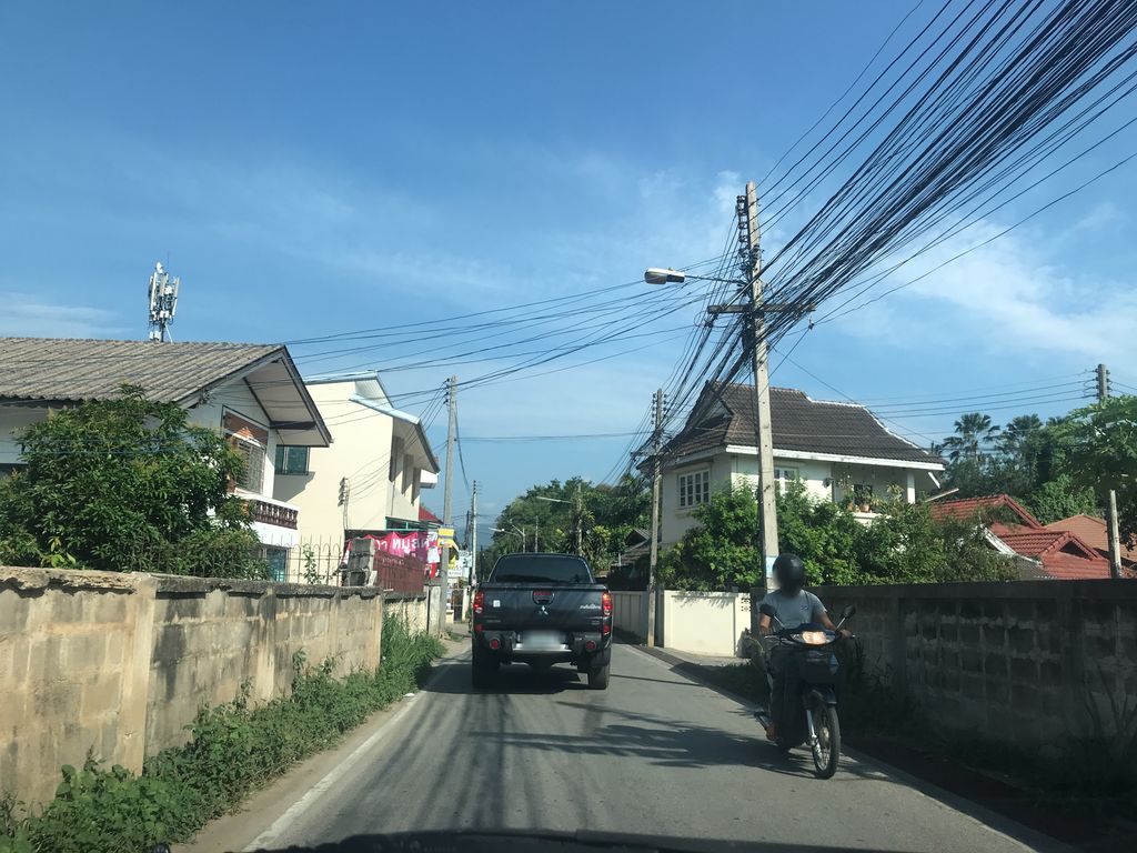 ภาพถนนตรงที่ จำรัสมอเตอร์ไซค์ ตั้งอยู่ ถ่ายโดย prasert พ.ศ. 2561 (2018) · A street-level view of where จำรัสมอเตอร์ไซค์ · Chamrat Motorcycle stands, by prasert in 2561 (2018)
