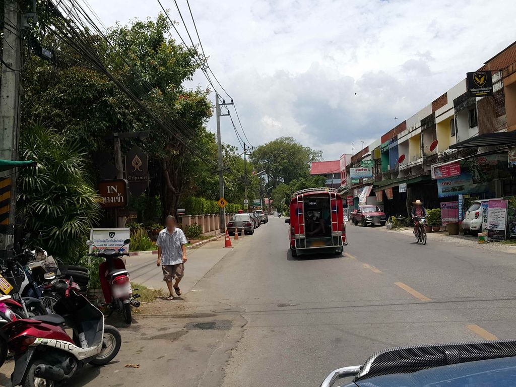 ภาพถนนตรงที่ นิกรมอเตอร์ไซค์ ตั้งอยู่ ถ่ายโดย jrcarlsen พ.ศ. 2558 (2015) · A street-level view of where นิกรมอเตอร์ไซค์ · Nik Motorcycle stands, by jrcarlsen in 2558 (2015)