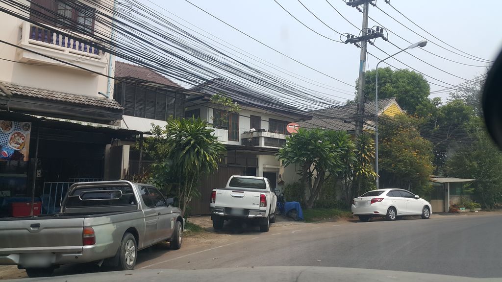 ภาพถนนตรงที่ ร้านซ่อมมอเตอร์ไซค์ [วังสิงห์คำ] ตั้งอยู่ ถ่ายโดย jrcarlsen พ.ศ. 2562 (2019) · A street-level view of where ร้านซ่อมมอเตอร์ไซค์ [วังสิงห์คำ] · Ran Som Motorcycle [wangsingkham] stands, by jrcarlsen in 2562 (2019)