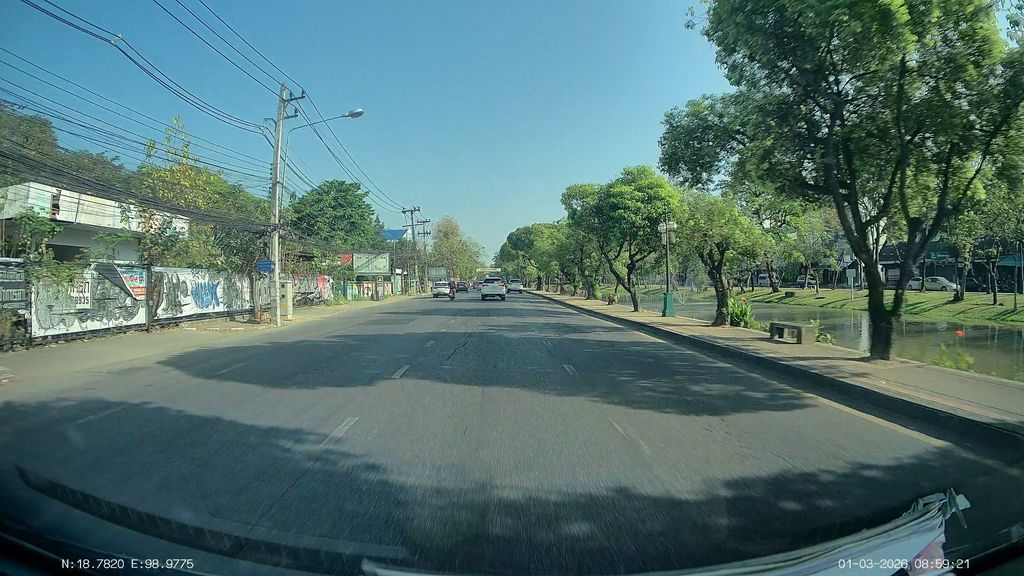 ภาพถนนตรงที่ กราฟฟิตีบนกำแพง ตั้งอยู่ ถ่ายโดย ThailandCambodia พ.ศ. 2569 (2026) · A street-level view of where Long bombing wall of black tags stands, by ThailandCambodia in 2569 (2026)