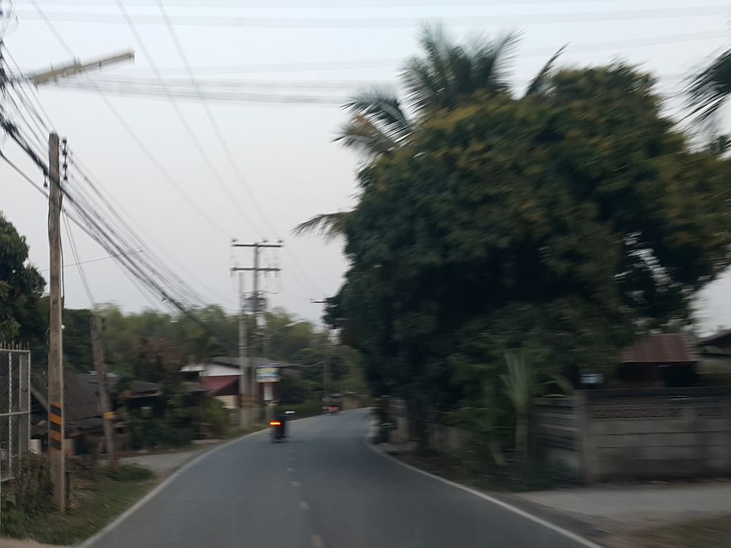 ภาพถนนตรงที่ สถานีอนามัยตำบลสันป่ายาง ตั้งอยู่ ถ่ายโดย jrcarlsen พ.ศ. 2559 (2016) · A street-level view of where สถานีอนามัยตำบลสันป่ายาง · Tambon San Pa Yang Health station stands, by jrcarlsen in 2559 (2016)