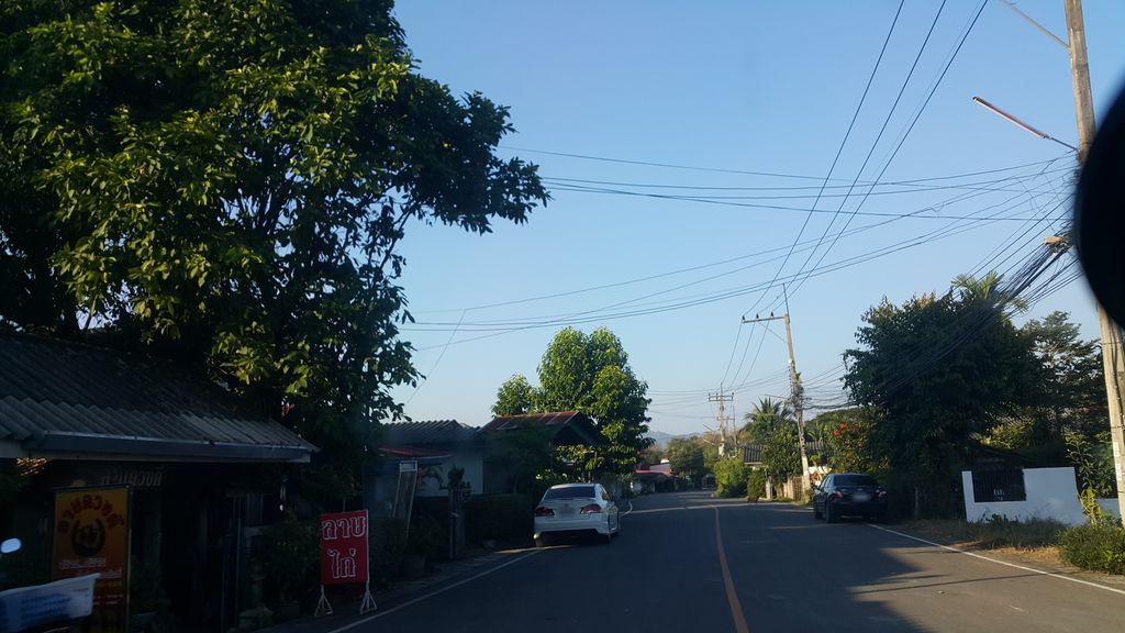 ภาพถนนตรงที่ ลาบดวงดี ดอยสะเก็ด ตั้งอยู่ ถ่ายโดย jrcarlsen พ.ศ. 2562 (2019) · A street-level view of where ลาบดวงดี ดอยสะเก็ด · Lapduangdi Doi Saket stands, by jrcarlsen in 2562 (2019)