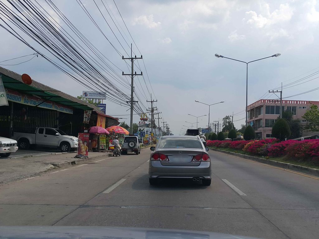 ภาพถนนตรงที่ ร้านอาหารญี่ปุ่นทาเคชิ เชียงใหม่59 ตั้งอยู่ ถ่ายโดย jrcarlsen พ.ศ. 2558 (2015) · A street-level view of where ร้านอาหารญี่ปุ่นทาเคชิ เชียงใหม่59 · Yipun Tha Khe Chi Chiang Mai59 Restaurant stands, by jrcarlsen in 2558 (2015)