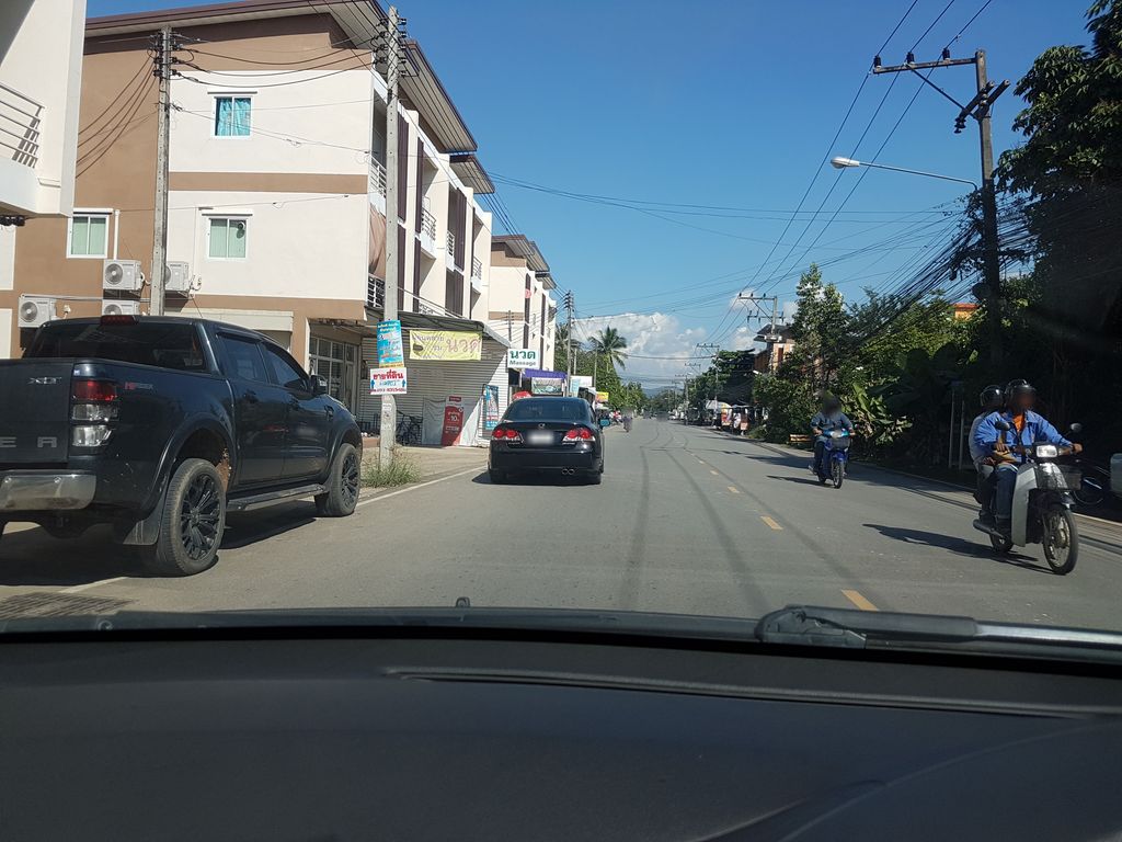 ภาพถนนตรงที่ SabaiijaiCoffee ตั้งอยู่ ถ่ายโดย ekkarin พ.ศ. 2561 (2018) · A street-level view of where SabaiijaiCoffee stands, by ekkarin in 2561 (2018)