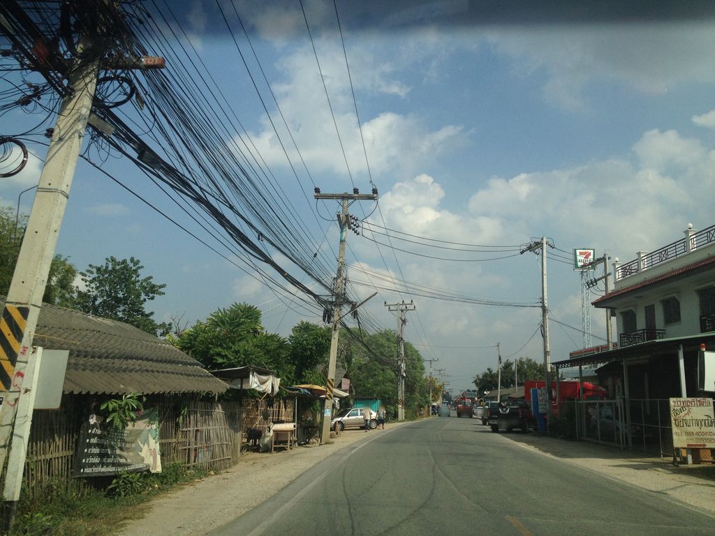 ภาพถนนตรงที่ ศกร.ตำบลขัวมุง ตั้งอยู่ ถ่ายโดย jimwatana พ.ศ. 2558 (2015) · A street-level view of where ศกร.ตำบลขัวมุง · Sakon.Tambon Khua Mung stands, by jimwatana in 2558 (2015)
