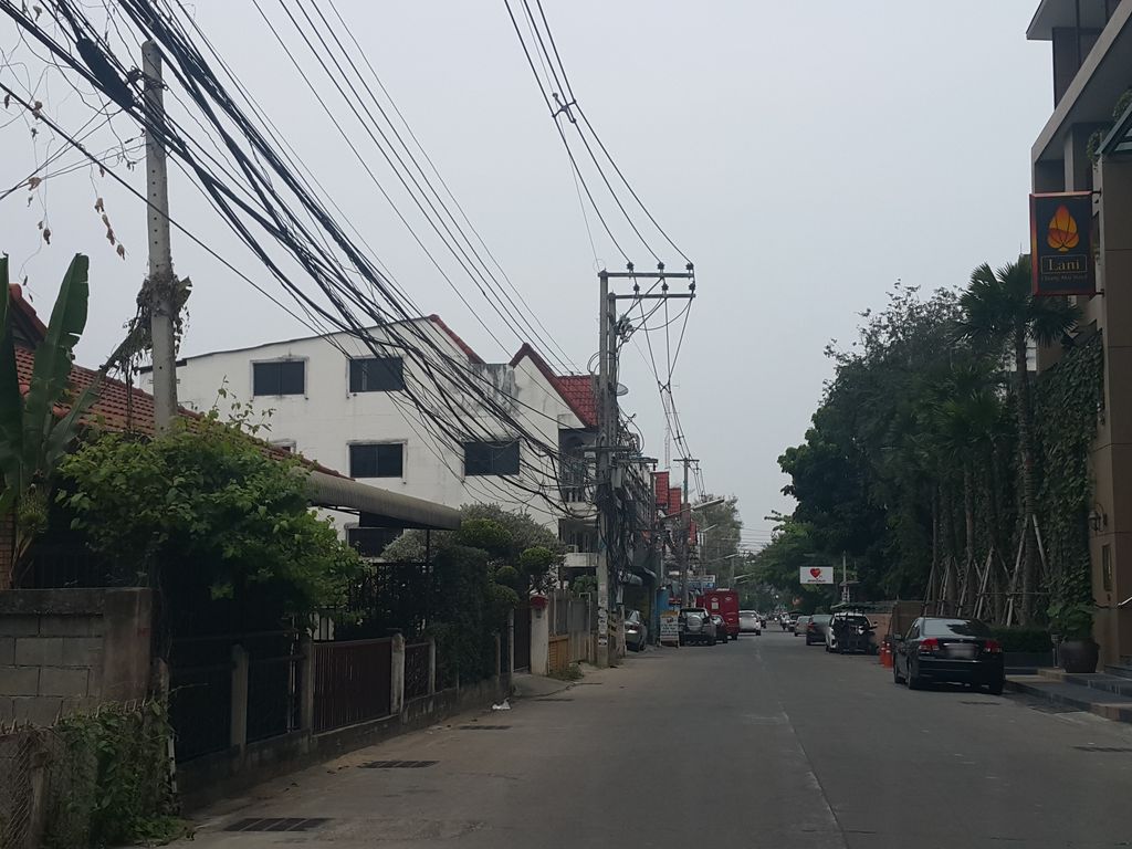 ภาพถนนตรงที่ สุริยะ มอเตอร์ ช๊อป // Suriya motor shop chiangmai. ตั้งอยู่ ถ่ายโดย jrcarlsen พ.ศ. 2559 (2016) · A street-level view of where สุริยะ มอเตอร์ ช๊อป // Suriya motor shop chiangmai. stands, by jrcarlsen in 2559 (2016)
