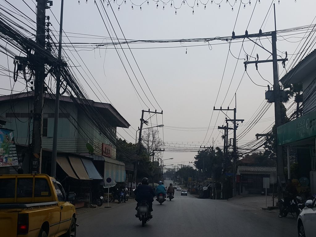 ภาพถนนตรงที่ คลีนิคหมอ ธวัชชัย เชียงดาว ตั้งอยู่ ถ่ายโดย jrcarlsen พ.ศ. 2559 (2016) · A street-level view of where คลีนิคหมอ ธวัชชัย เชียงดาว · Clinic Mo Thawatchai Chiang Dao stands, by jrcarlsen in 2559 (2016)