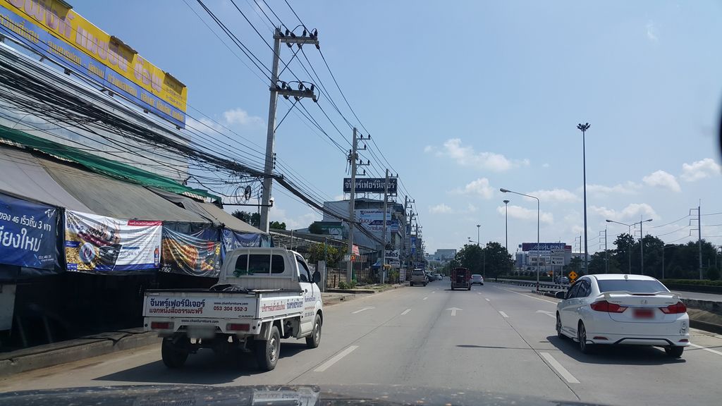 ภาพถนนตรงที่ บริษัท นครพิงค์ แมชชีน ช็อพ จำกัด ตั้งอยู่ ถ่ายโดย jrcarlsen พ.ศ. 2559 (2016) · A street-level view of where บริษัท นครพิงค์ แมชชีน ช็อพ จำกัด · Nakhon Ping Maetchin Choop Chamkat Company stands, by jrcarlsen in 2559 (2016)