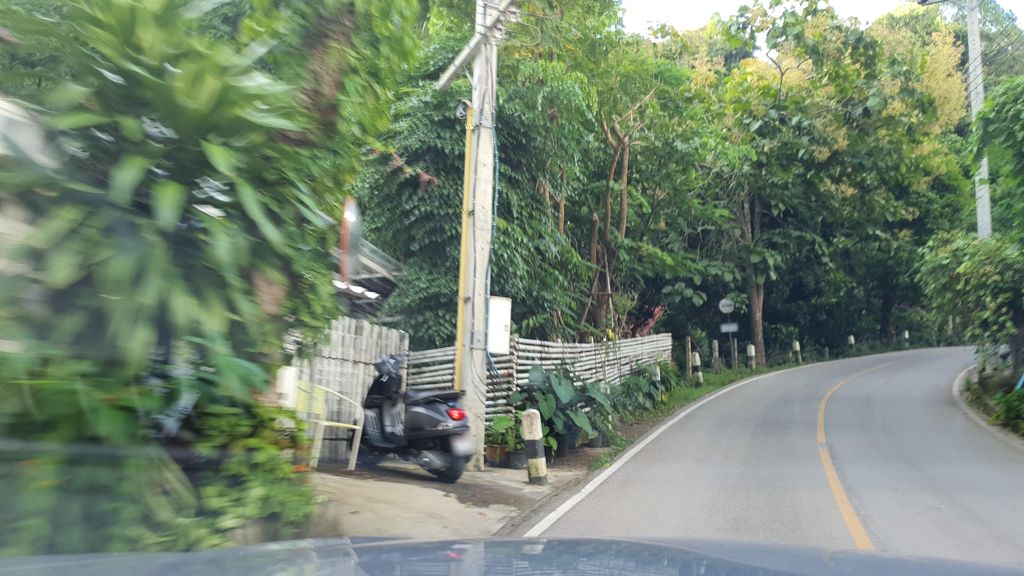 ภาพถนนตรงที่ โฮมสเตย์ บ้านไผ่ล้อม ตั้งอยู่ ถ่ายโดย jrcarlsen พ.ศ. 2564 (2021) · A street-level view of where โฮมสเตย์ บ้านไผ่ล้อม · Homestay Ban Phlaiom stands, by jrcarlsen in 2564 (2021)