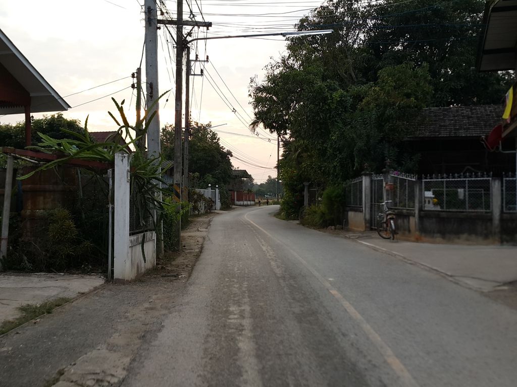 ภาพถนนตรงที่ ศักดิ์สิทธิ์ทำป้าย (ผู้ใหญ่บ้าน หมู่ 3) ตั้งอยู่ ถ่ายโดย jrcarlsen พ.ศ. 2558 (2015) · A street-level view of where ศักดิ์สิทธิ์ทำป้าย (ผู้ใหญ่บ้าน หมู่ 3) · Saksit Thampai (phuyaiban Mu 3) stands, by jrcarlsen in 2558 (2015)