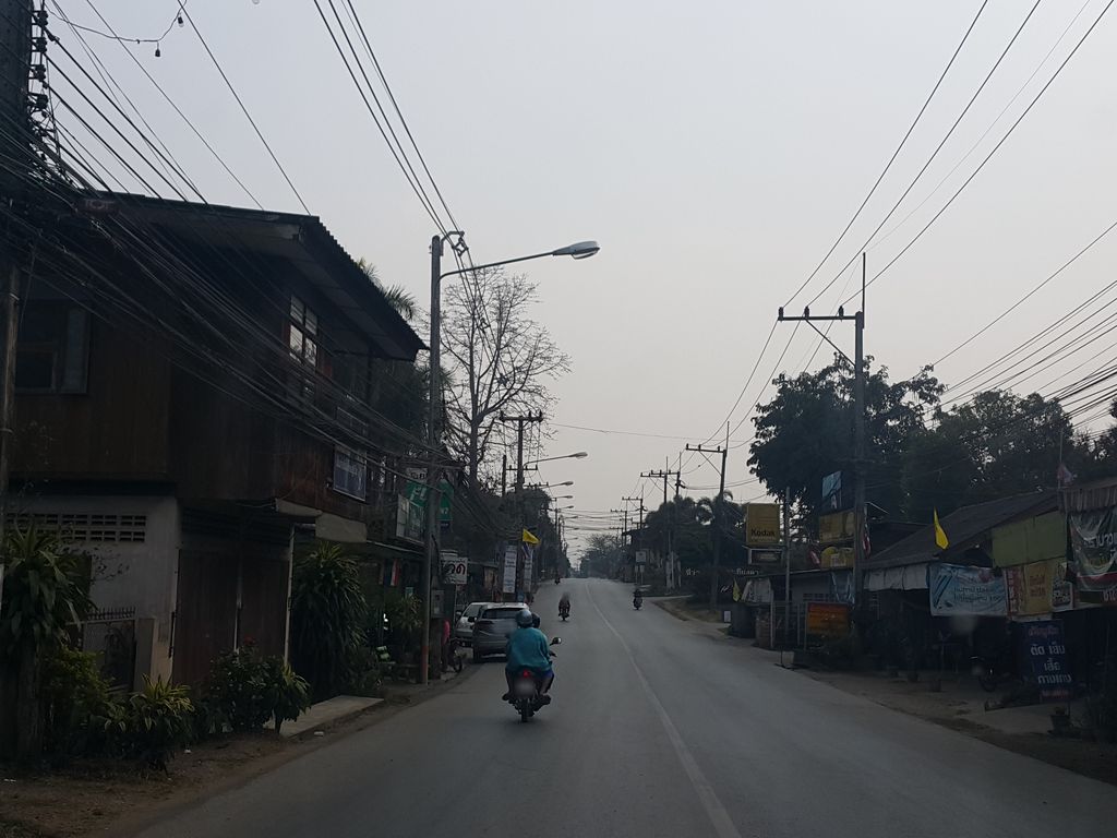ภาพถนนตรงที่ สบายหัวบาร์เบอร์ ตัดผมชายเชียงดาว ตั้งอยู่ ถ่ายโดย jrcarlsen พ.ศ. 2559 (2016) · A street-level view of where สบายหัวบาร์เบอร์ ตัดผมชายเชียงดาว · Sabaihua Barber Tatphomchai Chiang Dao stands, by jrcarlsen in 2559 (2016)