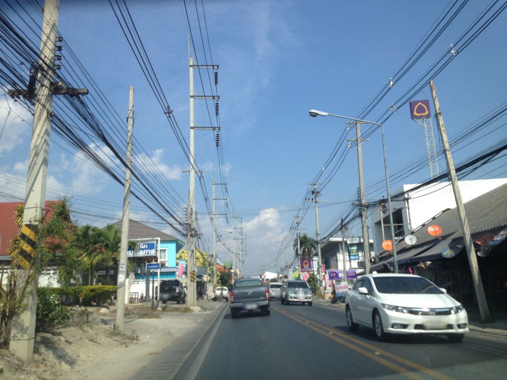 ภาพถนนตรงที่ ซีที วอเตอร์ ตั้งอยู่ ถ่ายโดย jimwatana พ.ศ. 2558 (2015) · A street-level view of where ซีที วอเตอร์ · C Thi Water stands, by jimwatana in 2558 (2015)