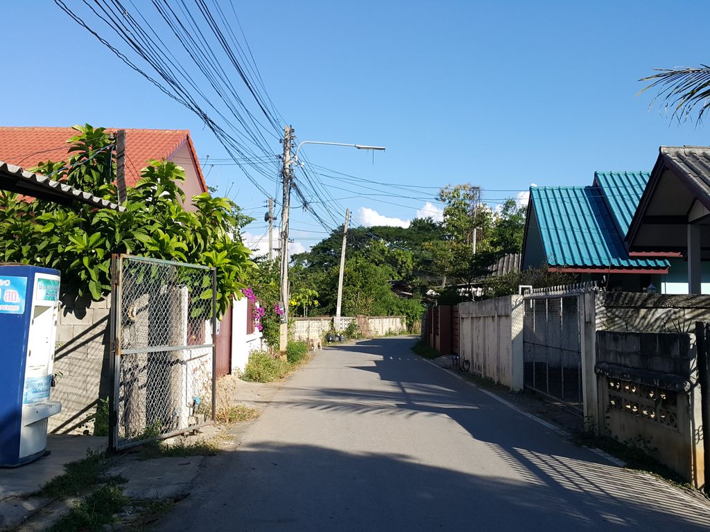 ภาพถนนตรงที่ บ้านปูคาหัวฝาย ตั้งอยู่ ถ่ายโดย jrcarlsen พ.ศ. 2558 (2015) · A street-level view of where บ้านปูคาหัวฝาย · Ban Pukhahuafai stands, by jrcarlsen in 2558 (2015)