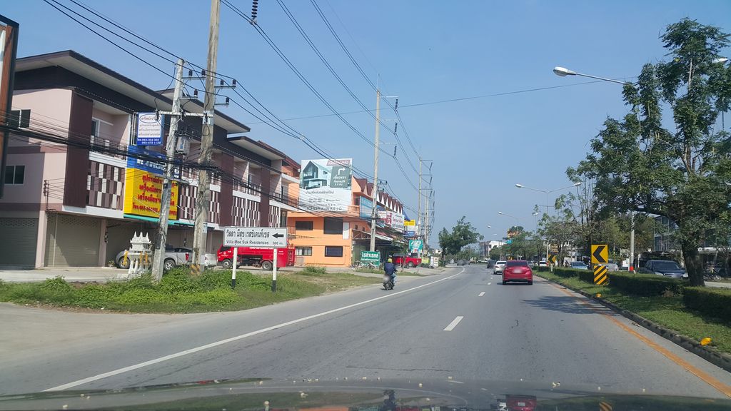 ภาพถนนตรงที่ ECG - Chiang Mai สาขาแม่โจ้ ตั้งอยู่ ถ่ายโดย jrcarlsen พ.ศ. 2562 (2019) · A street-level view of where ECG - Chiang Mai สาขาแม่โจ้ stands, by jrcarlsen in 2562 (2019)