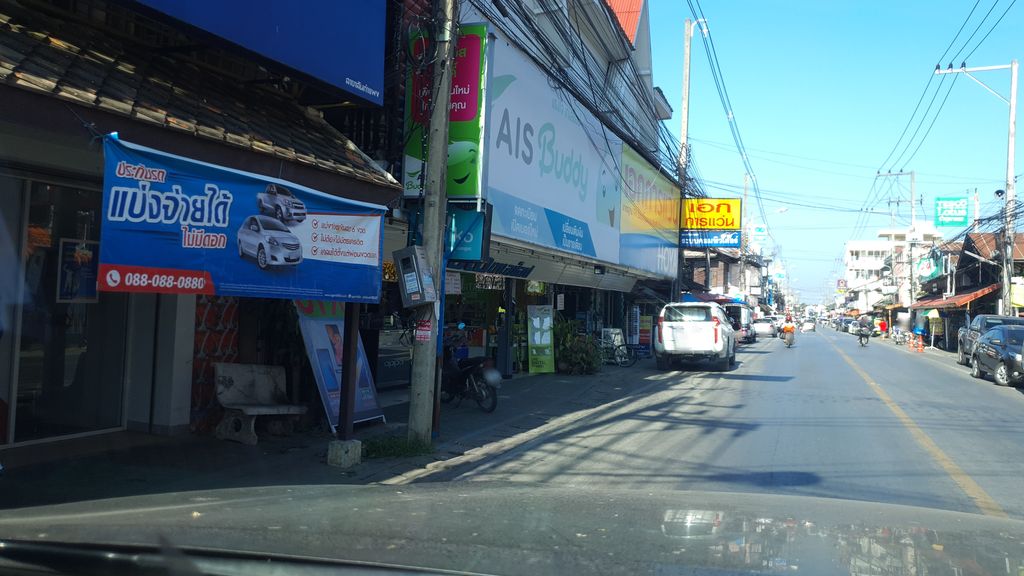 ภาพถนนตรงที่ หมอสวนดอก(สันกำแพง) ตั้งอยู่ ถ่ายโดย jrcarlsen พ.ศ. 2562 (2019) · A street-level view of where หมอสวนดอก(สันกำแพง) · Mo Suan Dok(San Kamphaeng) stands, by jrcarlsen in 2562 (2019)