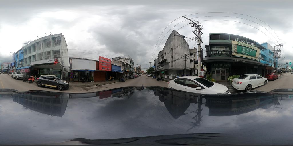 ภาพถนนตรงที่ มินตรา ผ้าไทย ตั้งอยู่ ถ่ายโดย SoT พ.ศ. 2568 (2025) · A street-level view of where Mintra Thai Clothing stands, by SoT in 2568 (2025)