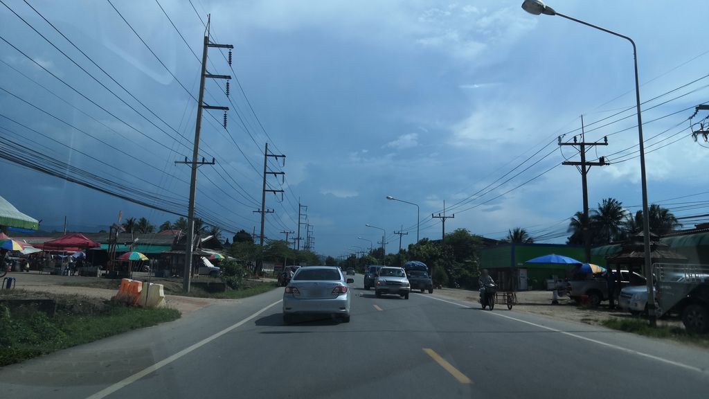 ภาพถนนตรงที่ ตั้งเตา ตั้งอยู่ ถ่ายโดย charlesano พ.ศ. 2561 (2018) · A street-level view of where ตั้งเตา · Tangtao stands, by charlesano in 2561 (2018)
